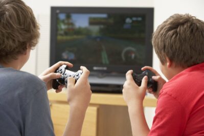 Children Playing with Game Console