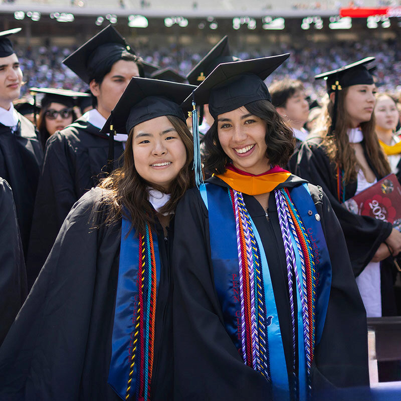 Wharton students at their graduation in caps and gowns