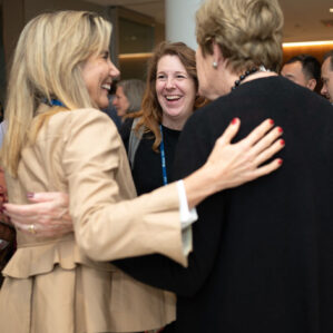 Alumni greeting each other at Reunion