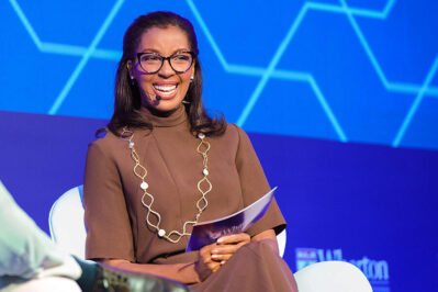 Close up photo of Dean Erika James speaking at Wharton Global Forum in São Paulo