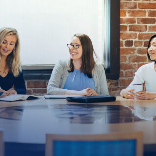 Wharton Circles members sitting at a round table