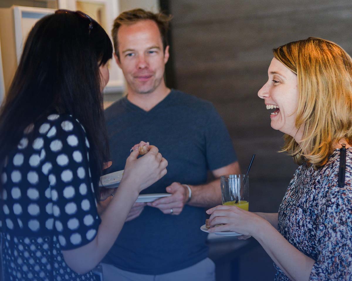 Wharton Circles members conversing during a reception at MBA Reunon