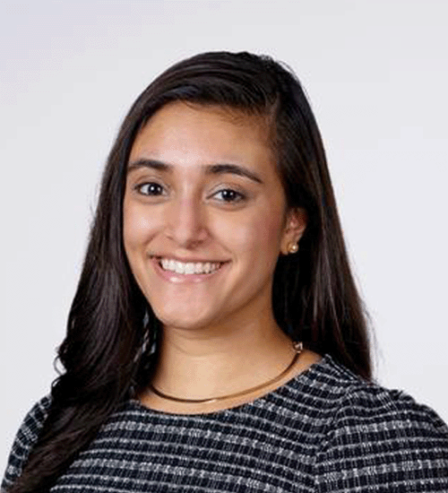 Tanna Dilesha with long hair and smiling